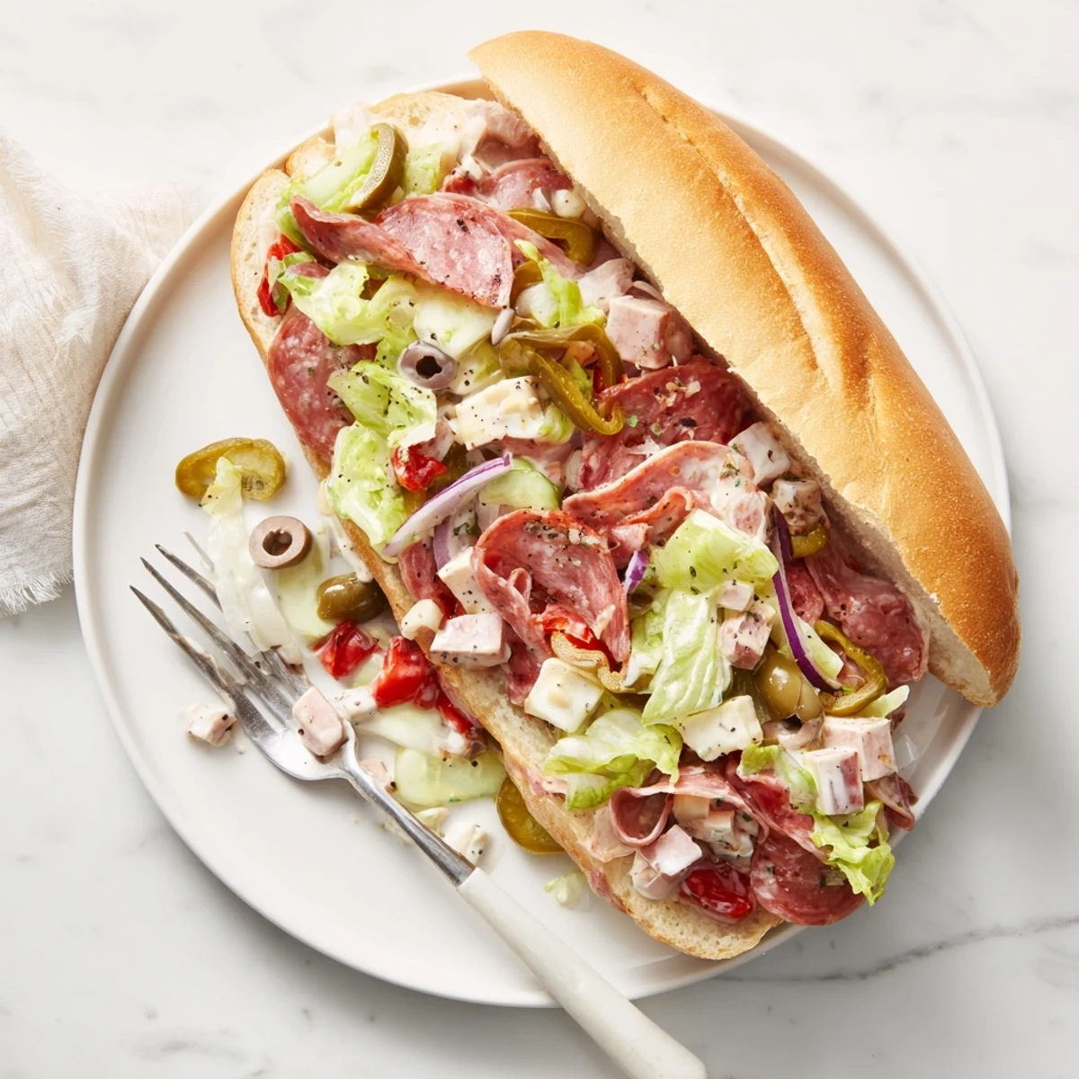 Colorful Flavor Mash-Up Sandwiches stacked with fresh veggies and Italian meats.  