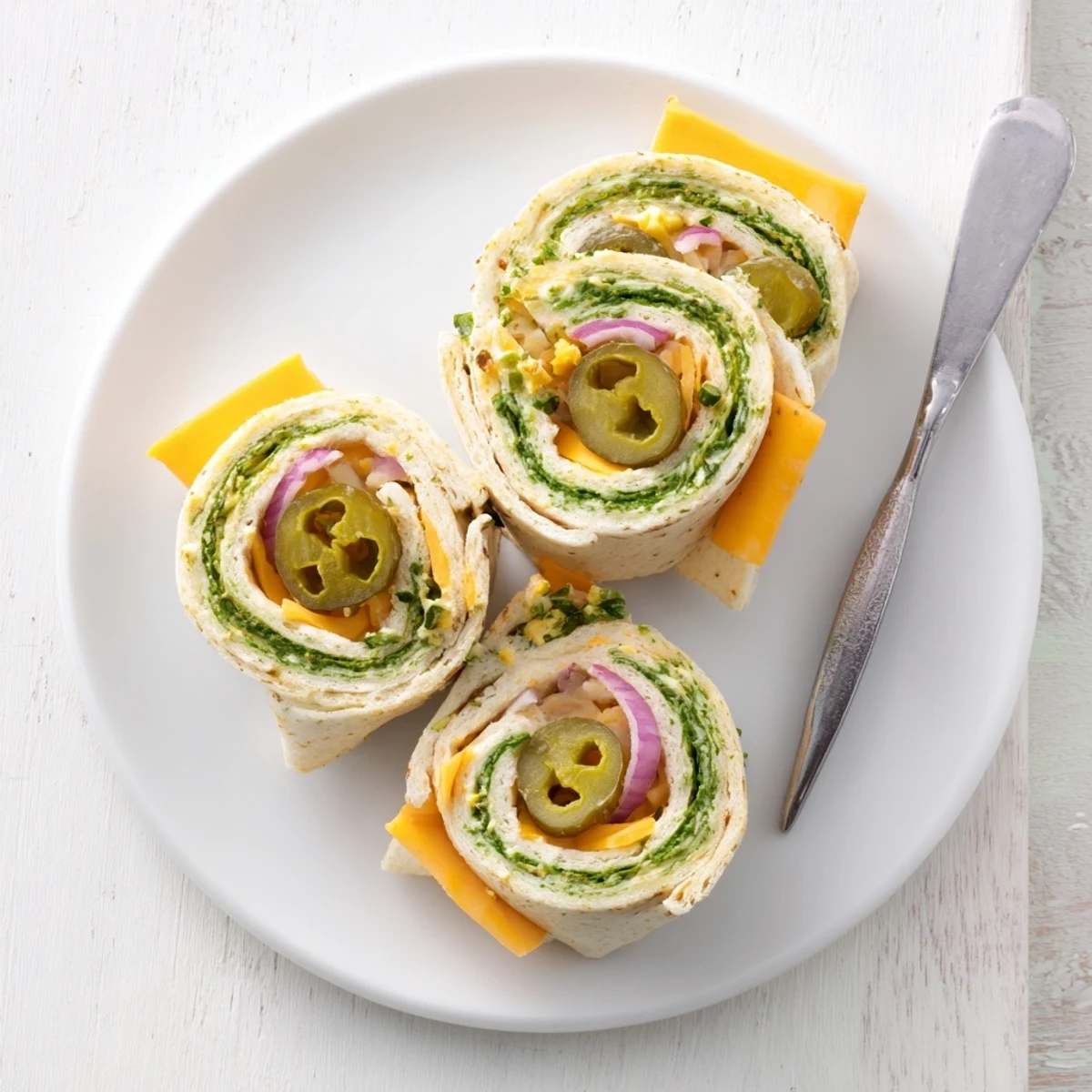 Delicious pickle-in-a-blanket snacks perfect for parties or casual gatherings.  