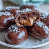 Decadent peanut butter-filled Easter eggs coated in rich dark chocolate and finished with a sprinkle of sea salt for a sweet-salty treat.  