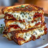 Crispy Italian bread sandwich filled with pepperoni, melted cheese, and pizza sauce.