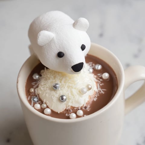 Steaming Polar Bear Hot Chocolate Platter, topped with whipped cream and adorable marshmallow bears.