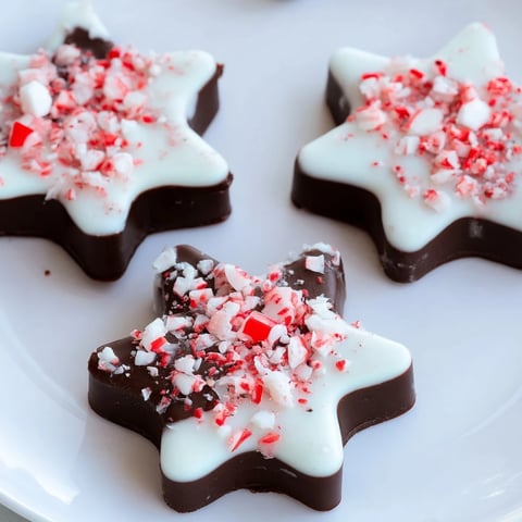 Close-up picture of glistening Peppermint Bark Snowflakes, showcasing layers and scattered crushed peppermint.