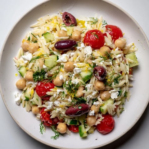 Vibrant Greek Lemon-Orzo Bean Salad with fresh dill, ready to eat; imagine the bright flavors.