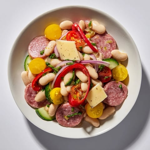 Italian Antipasto Bean Salad, bursting with fresh vegetables and creamy cannellini beans, ready to serve.