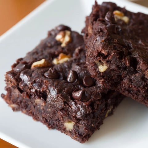 A batch of rich, gooey black bean brownies, perfect for a gluten-free dessert option.