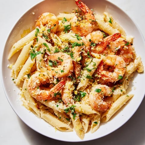 Golden Garlic Shrimp Penne, a comforting Italian-American pasta dish, ready to savor.