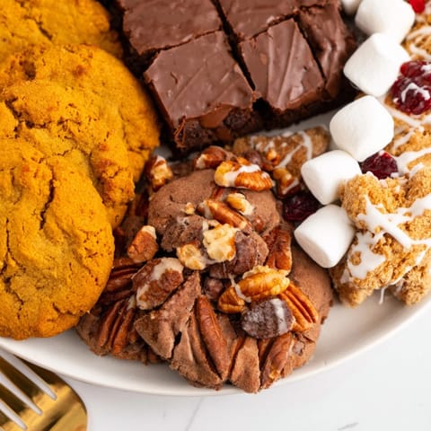 Festive Thanksgiving Fudge Cookie Tray with pecan shortbread and decorative toppings.  