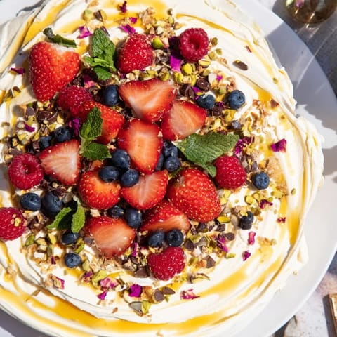 Delicious Butter Board Dessert featuring whipped cream cheese, drizzled with honey and fresh mint.  