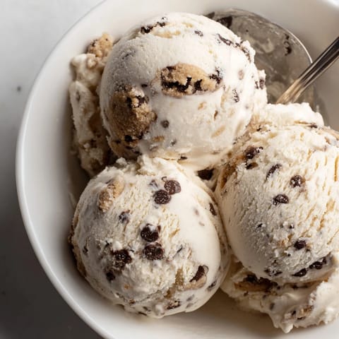 Indulge in this smooth cottage cheese ice cream paired with cookie dough bites.  