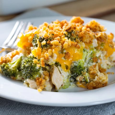 Creamy Chicken & Broccoli Cheddar Bake topped with crispy breadcrumbs, perfect for dinner.