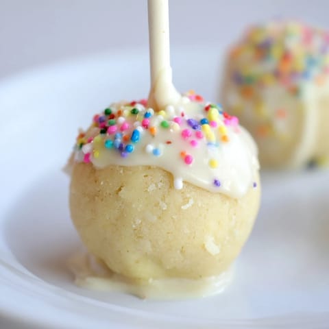 Bite-sized Lightened-Up Sugar Cookie Cake Pops, a delicious, guilt-free dessert, ready to enjoy.
