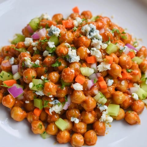 Creamy Buffalo Chicken Bean Salad, featuring tangy blue cheese topping the flavorful bean mixture.