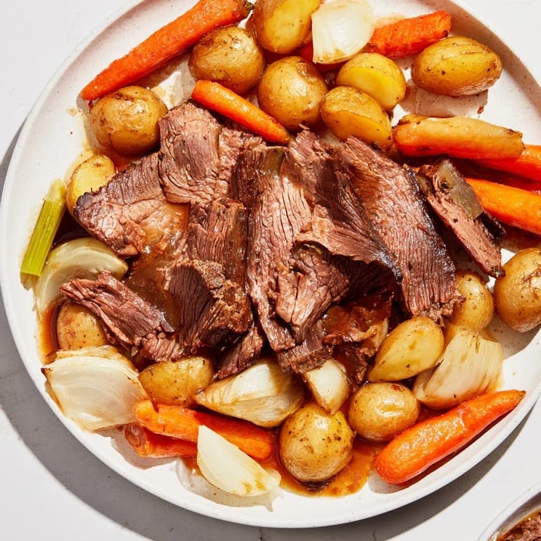 Delicious, mouthwatering image of a perfectly cooked Sunday Pot Roast ready to serve.