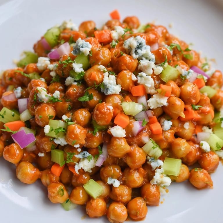 Creamy Buffalo Chicken Bean Salad, featuring tangy blue cheese topping the flavorful bean mixture.